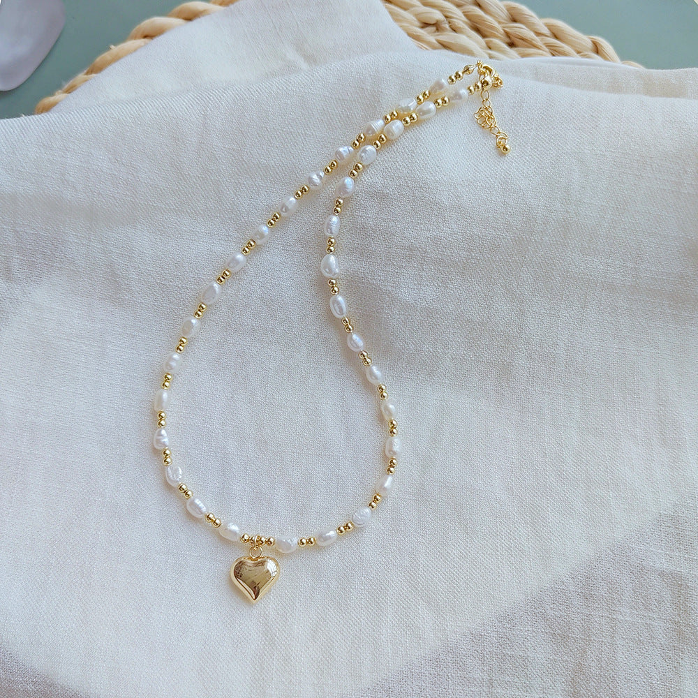 Pearl necklace love pendant