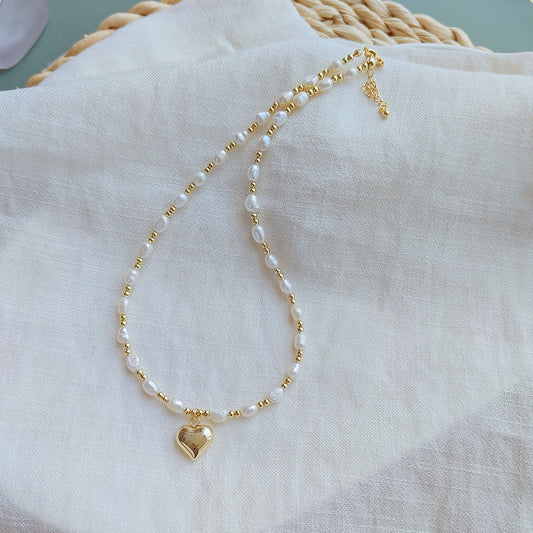 Pearl necklace love pendant