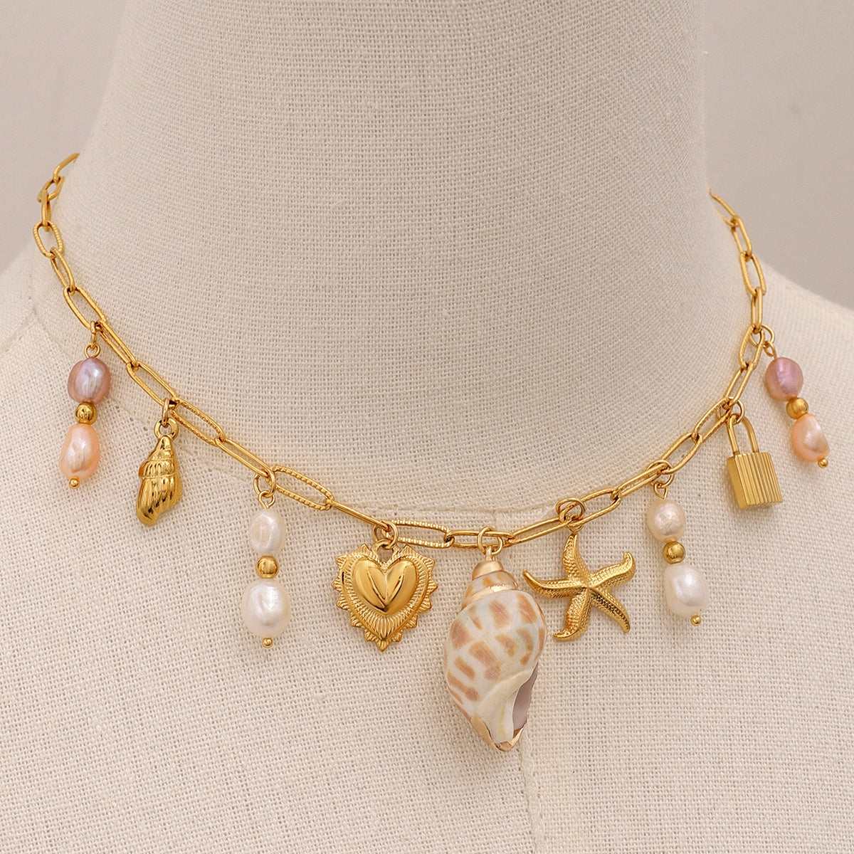 Hammered starfish pearl conch heart pendant necklace