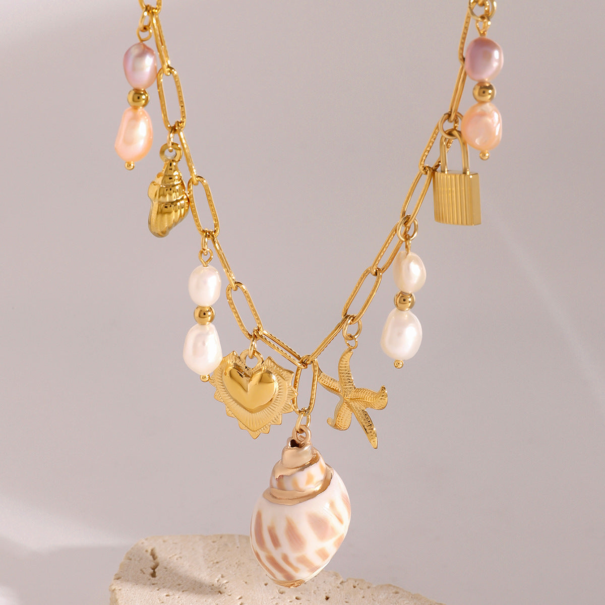 Hammered starfish pearl conch heart pendant necklace